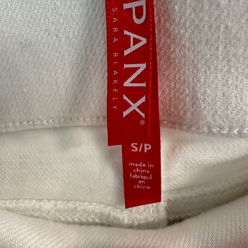 Spanx small white distressed jeans